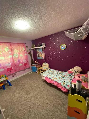 48 Falchurch Crescent Ne, Calgary, AB - Indoor Photo Showing Bedroom