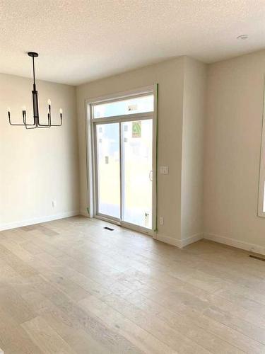 124 Crimson Ridge Place Nw, Calgary, AB - Indoor Photo Showing Kitchen With Double Sink