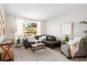 209 Acacia Drive Se, Airdrie, AB  - Indoor Photo Showing Living Room 