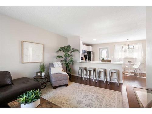 209 Acacia Drive Se, Airdrie, AB - Indoor Photo Showing Living Room