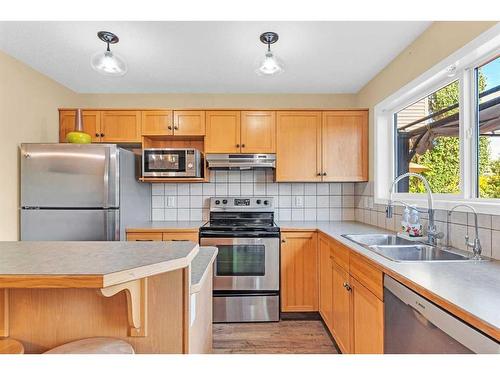 246 Cramond Circle Se, Calgary, AB - Indoor Photo Showing Kitchen With Stainless Steel Kitchen With Double Sink