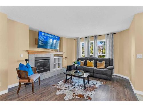 246 Cramond Circle Se, Calgary, AB - Indoor Photo Showing Living Room With Fireplace