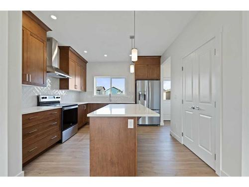 722 Bayview Hill Sw, Airdrie, AB - Indoor Photo Showing Kitchen