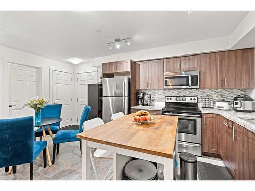 4115-99 Copperstone Park Se, Calgary, AB - Indoor Photo Showing Kitchen With Stainless Steel Kitchen With Upgraded Kitchen