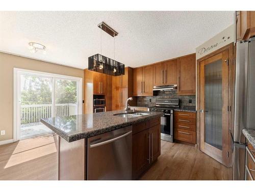 164 Schooner Close Nw, Calgary, AB - Indoor Photo Showing Kitchen With Double Sink