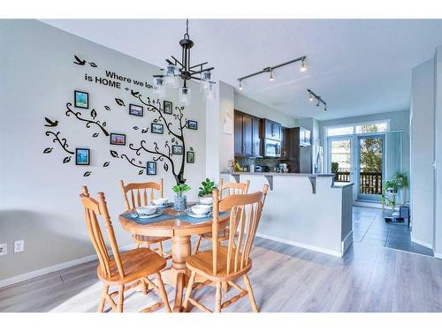 1406-125 Panatella Way Nw, Calgary, AB - Indoor Photo Showing Dining Room