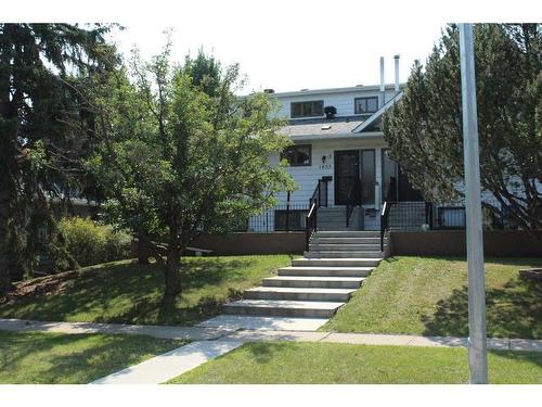 9-1435 96 Avenue Sw, Calgary, AB - Outdoor With Facade