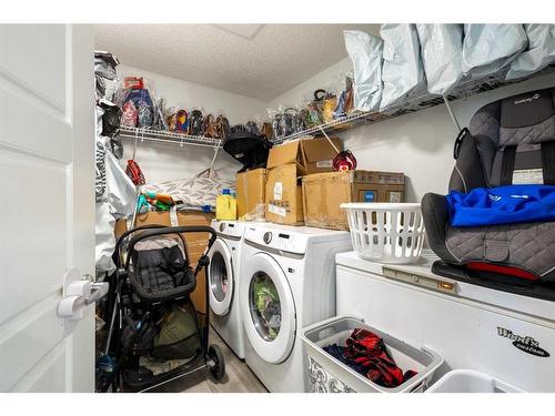 206-40 Carrington Plaza Nw, Calgary, AB - Indoor Photo Showing Laundry Room