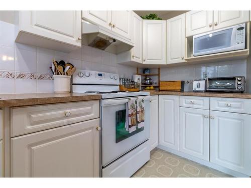 85 Taravista Way Ne, Calgary, AB - Indoor Photo Showing Kitchen