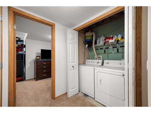 189 Everridge Way Sw, Calgary, AB - Indoor Photo Showing Laundry Room