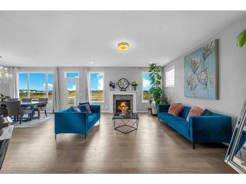 73 Cityside Way Ne, Calgary, AB - Indoor Photo Showing Living Room With Fireplace