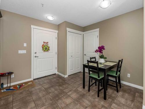 1107-175 Panatella Hill Nw, Calgary, AB - Indoor Photo Showing Kitchen