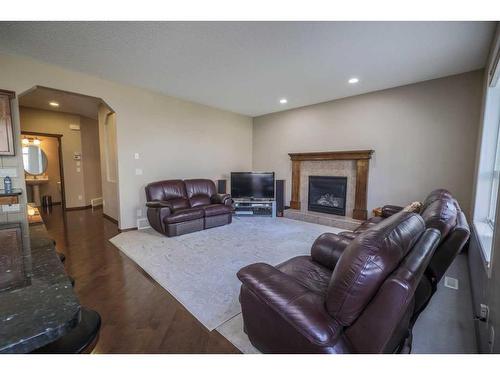 60 Pantego Heights Nw, Calgary, AB - Indoor Photo Showing Living Room With Fireplace