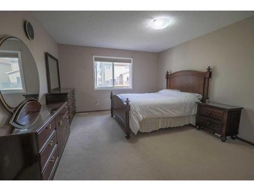 60 Pantego Heights Nw, Calgary, AB - Indoor Photo Showing Bedroom