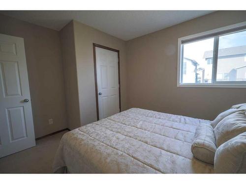 60 Pantego Heights Nw, Calgary, AB - Indoor Photo Showing Bedroom