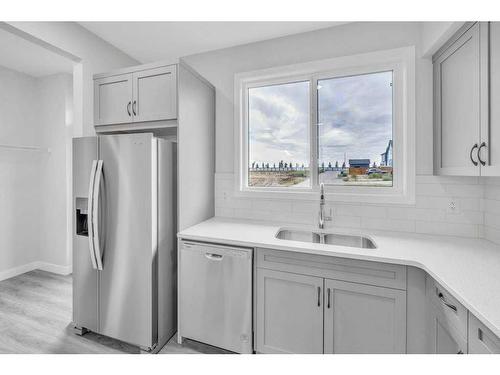 1616 Rangeview Drive Se, Calgary, AB - Indoor Photo Showing Kitchen With Double Sink