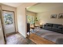 1663 Marlyn Way Ne, Calgary, AB  - Indoor Photo Showing Living Room 