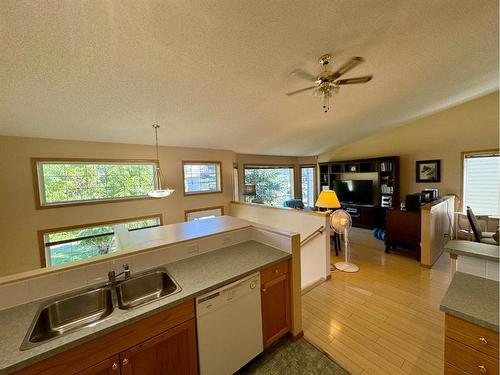 18 Cimarron Meadows Close, Okotoks, AB - Indoor Photo Showing Kitchen With Double Sink