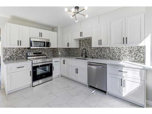 217-2211 19 Street Ne, Calgary, AB - Indoor Photo Showing Kitchen With Stainless Steel Kitchen With Upgraded Kitchen