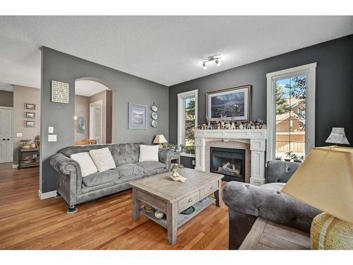 12 Cranleigh Heath Se, Calgary, AB - Indoor Photo Showing Living Room With Fireplace