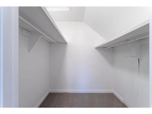 235 Avonburn Road Se, Calgary, AB - Indoor With Storage