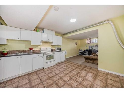 128 Taralake Terrace Ne, Calgary, AB - Indoor Photo Showing Kitchen With Double Sink