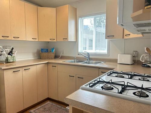 3084-35468 Range Road 30, Rural Red Deer County, AB - Indoor Photo Showing Kitchen With Double Sink