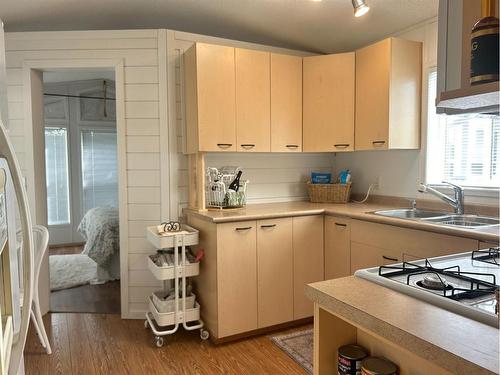 3084-35468 Range Road 30, Rural Red Deer County, AB - Indoor Photo Showing Kitchen With Double Sink