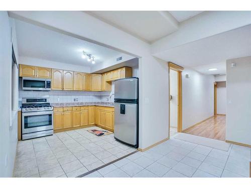 42 Mt Douglas Close Se, Calgary, AB - Indoor Photo Showing Kitchen