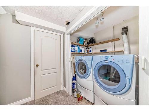 68 Templeby Way Ne, Calgary, AB - Indoor Photo Showing Laundry Room