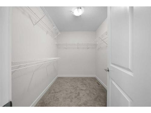 921 Bayview Heights Sw, Airdrie, AB - Indoor With Storage