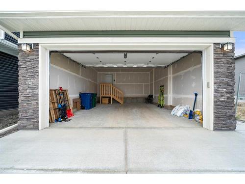 921 Bayview Heights Sw, Airdrie, AB - Indoor Photo Showing Garage