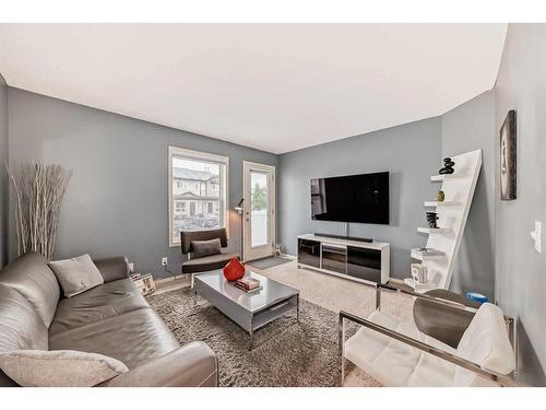 491 Saddlecrest Boulevard Ne, Calgary, AB - Indoor Photo Showing Living Room