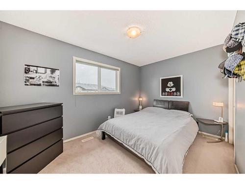 491 Saddlecrest Boulevard Ne, Calgary, AB - Indoor Photo Showing Bedroom