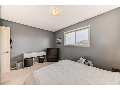 491 Saddlecrest Boulevard Ne, Calgary, AB - Indoor Photo Showing Bedroom