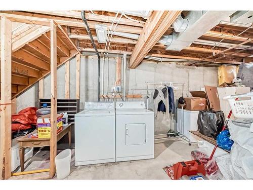 491 Saddlecrest Boulevard Ne, Calgary, AB - Indoor Photo Showing Laundry Room