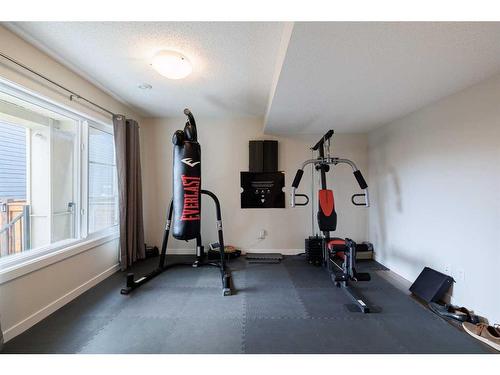 259 Sage Bluff Drive Nw, Calgary, AB - Indoor Photo Showing Gym Room