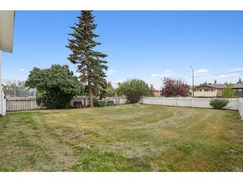 405 1 Avenue Ne, Airdrie, AB - Outdoor With Backyard