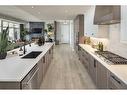 201-190 Marina Cove Se, Calgary, AB  - Indoor Photo Showing Kitchen With Upgraded Kitchen 