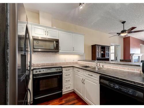 5204-14645 6 Street Sw, Calgary, AB - Indoor Photo Showing Kitchen With Double Sink