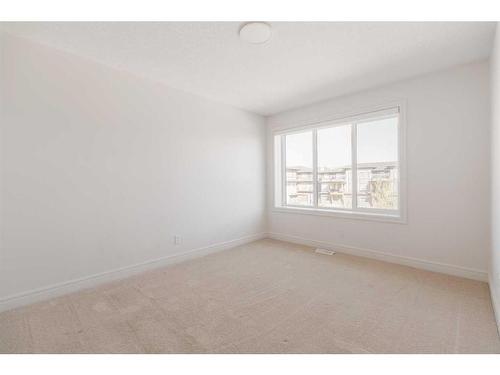 290 Seton Passage Se, Calgary, AB - Indoor Photo Showing Other Room