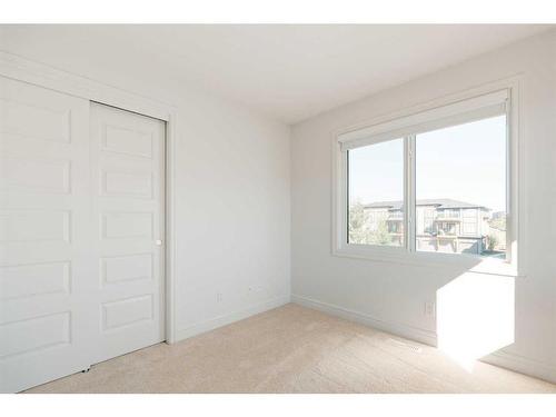 290 Seton Passage Se, Calgary, AB - Indoor Photo Showing Other Room