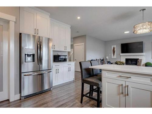 1360 Lackner Boulevard, Carstairs, AB - Indoor Photo Showing Kitchen