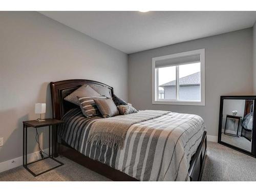 1360 Lackner Boulevard, Carstairs, AB - Indoor Photo Showing Bedroom