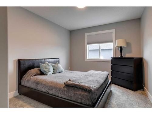 1360 Lackner Boulevard, Carstairs, AB - Indoor Photo Showing Bedroom