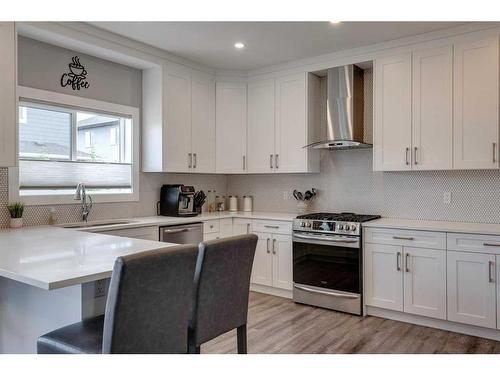 1360 Lackner Boulevard, Carstairs, AB - Indoor Photo Showing Kitchen