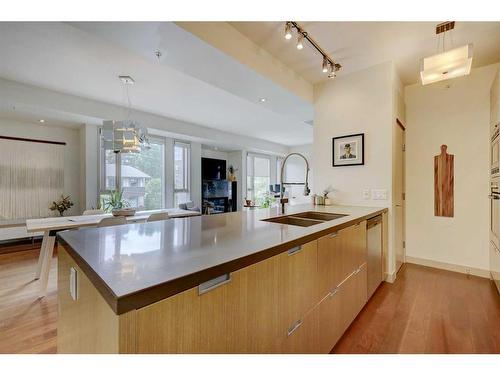 404-2905 16 Street Sw, Calgary, AB - Indoor Photo Showing Kitchen With Double Sink