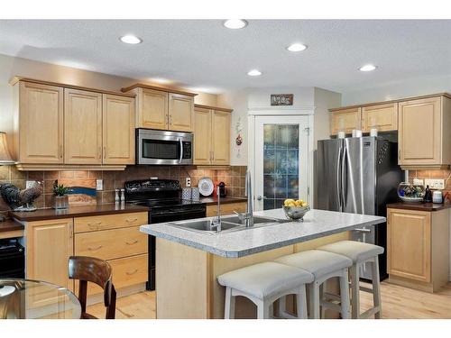 55 Everbrook Link Sw, Calgary, AB - Indoor Photo Showing Kitchen With Stainless Steel Kitchen With Double Sink