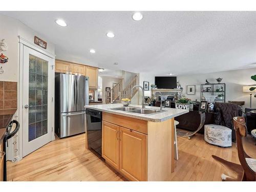 55 Everbrook Link Sw, Calgary, AB - Indoor Photo Showing Kitchen With Stainless Steel Kitchen With Double Sink