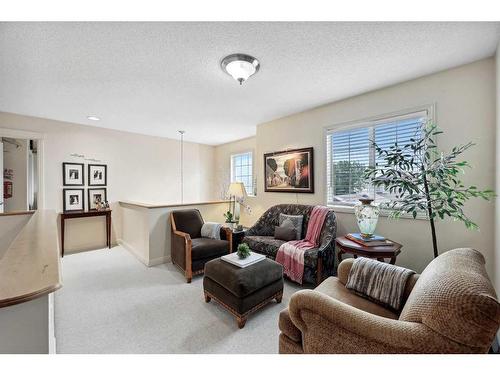 55 Everbrook Link Sw, Calgary, AB - Indoor Photo Showing Living Room